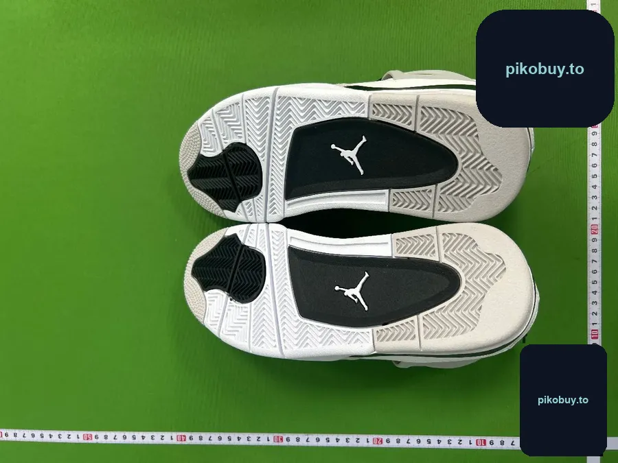 Warehouse QC photo of a jordan 4 black cat order