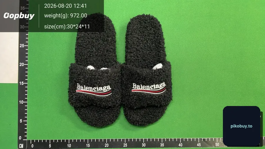 Warehouse QC photo of a balenciaga fur slides order