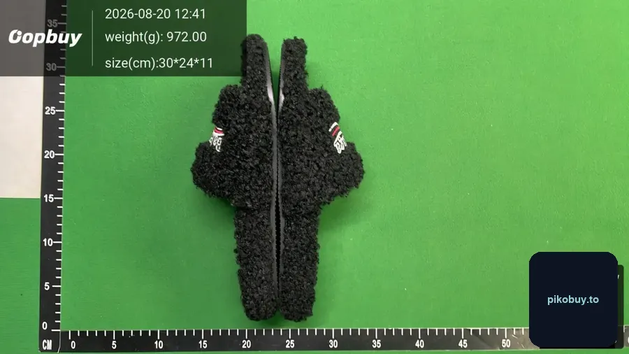 Warehouse QC photo of a balenciaga fur slides order